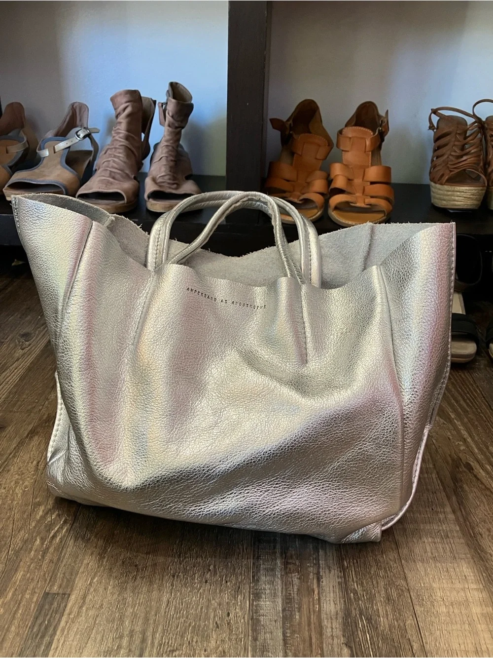 Ampersand As Apostrophe Sideways leather tote bag in a metallic silver finish